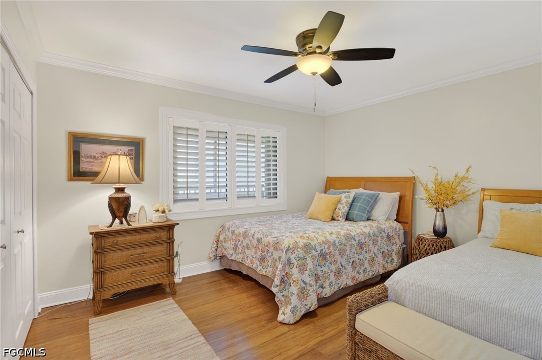 1900 Virginia Avenue, Unit 802 Fort Myers, FL 33901 - Photo 21 of 33 a bedroom with two beds and a couch