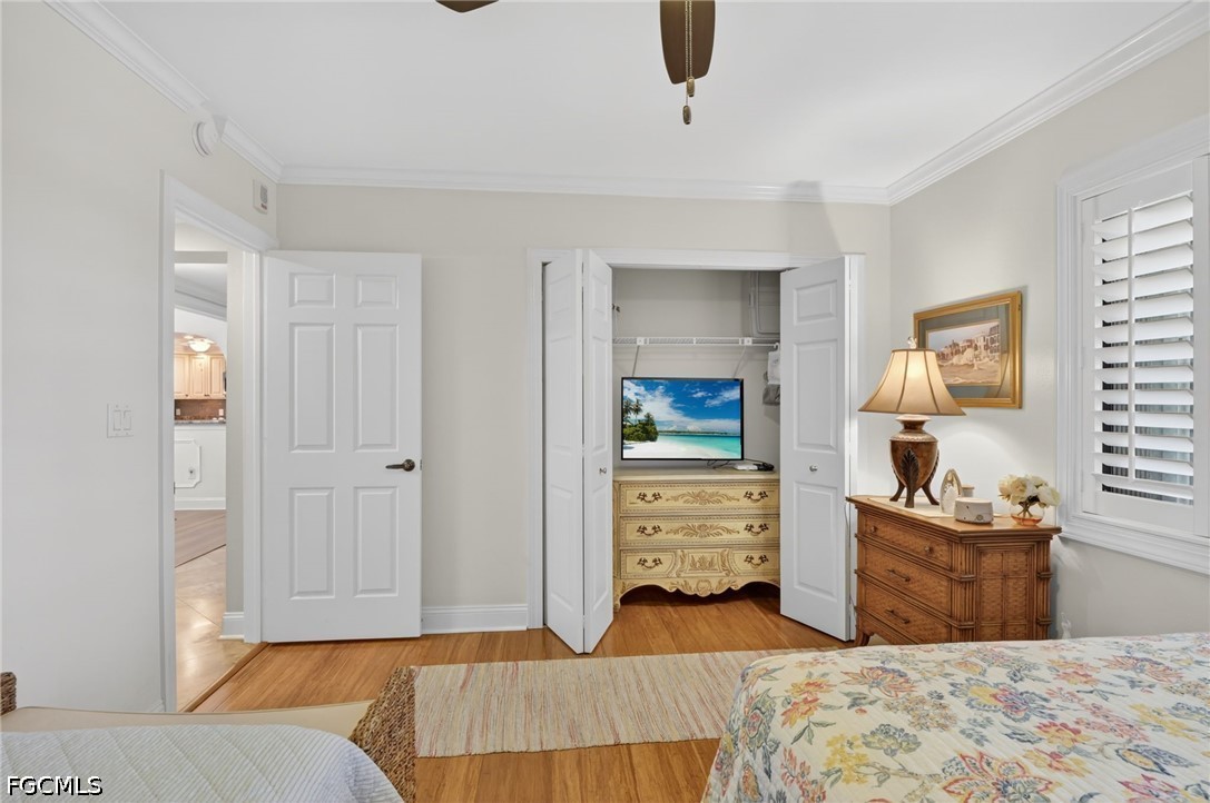 1900 Virginia Avenue, Unit 802 Fort Myers, FL 33901 - Photo 23 of 33 a bedroom with furniture and window