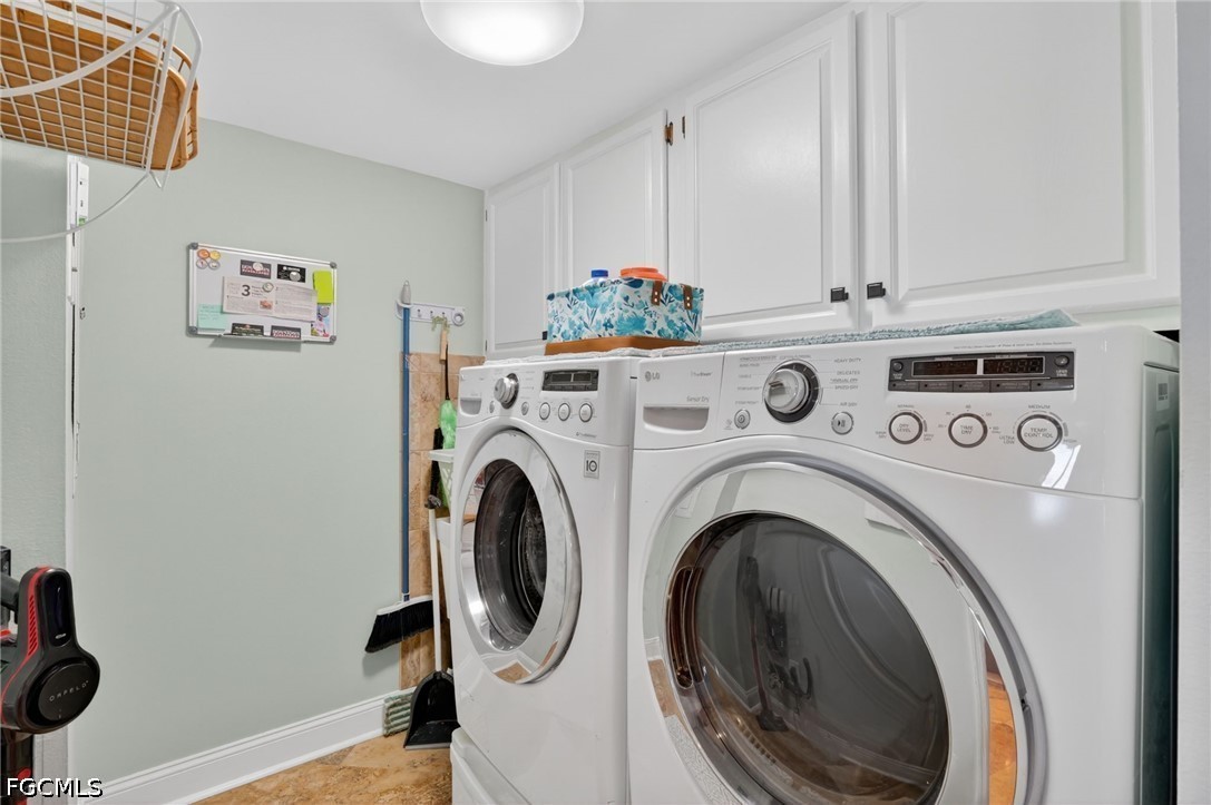 1900 Virginia Avenue, Unit 802 Fort Myers, FL 33901 - Photo 25 of 33 a utility room with dryer and washer