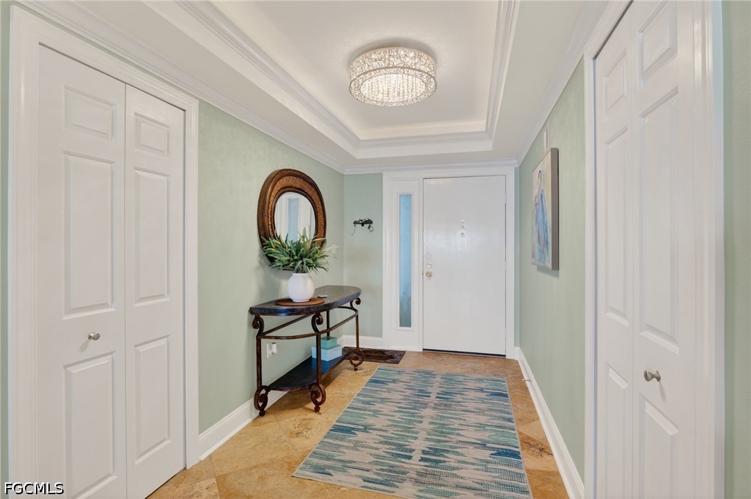 1900 Virginia Avenue, Unit 802 Fort Myers, FL 33901 - Photo 4 of 33 a view of a hallway to a livingroom with furniture