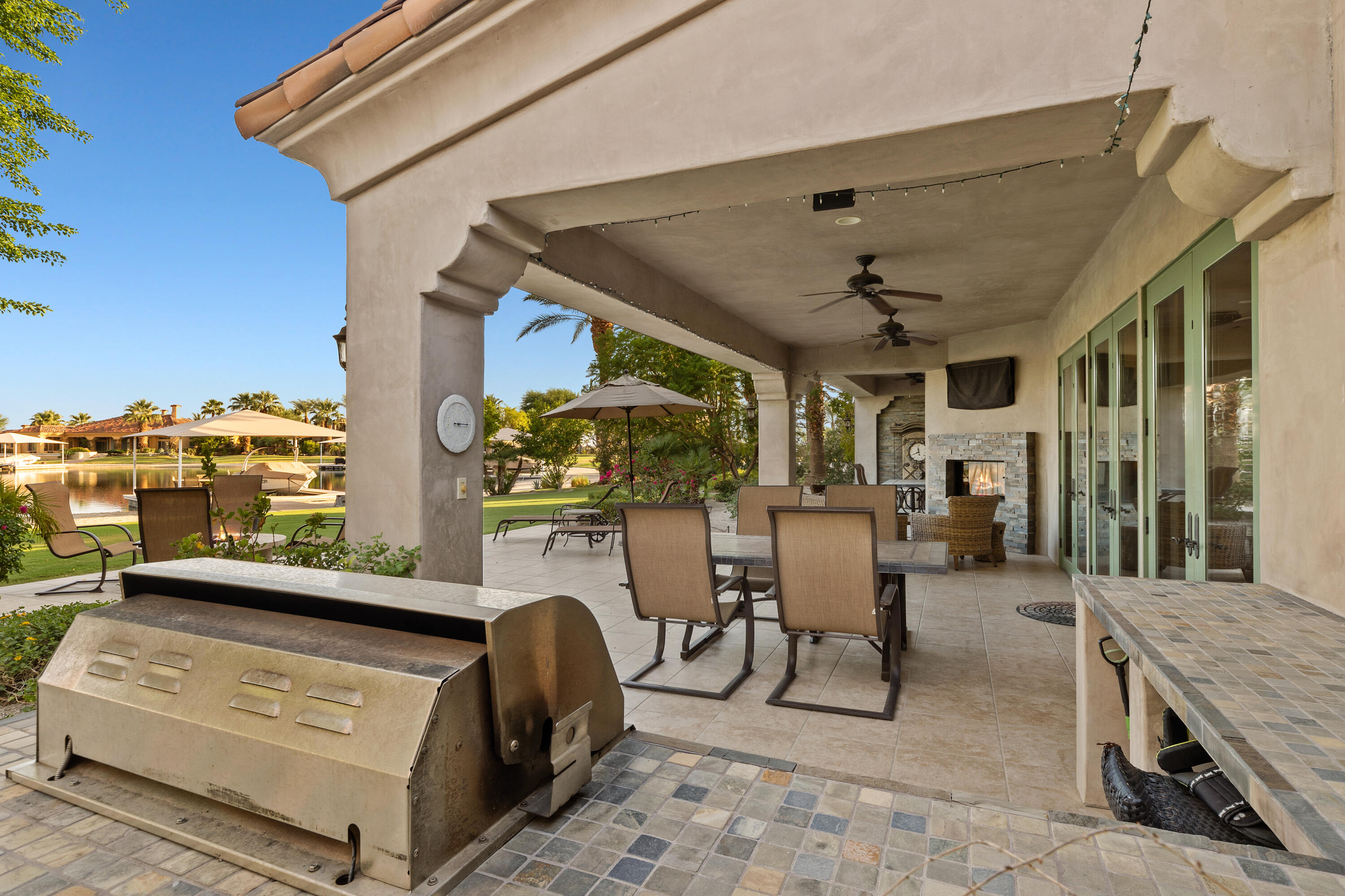83005 North Shore Drive Indio, CA 92203 - Photo 25 of 40 a view of a patio with a table and chairs