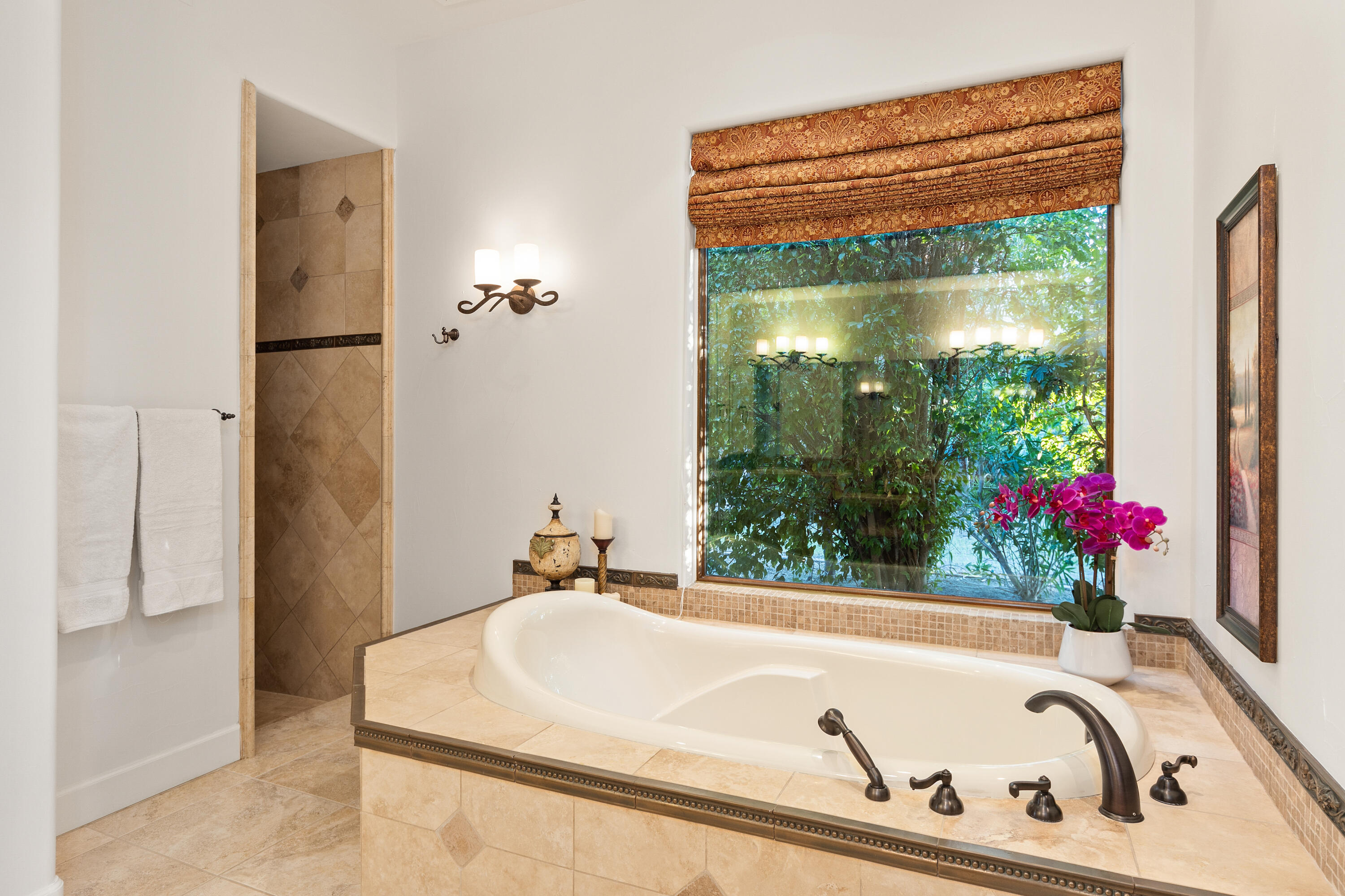 83005 North Shore Drive Indio, CA 92203 - Photo 26 of 40 a bathroom with a tub and shower