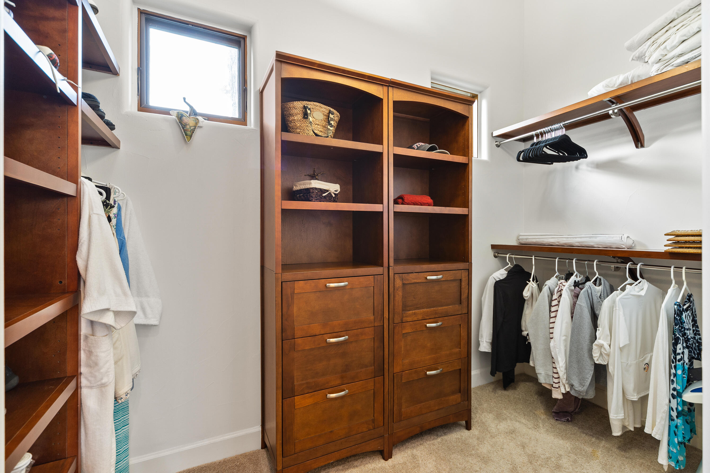 83005 North Shore Drive Indio, CA 92203 - Photo 29 of 40 a view of walk in closet with clothes and shoes
