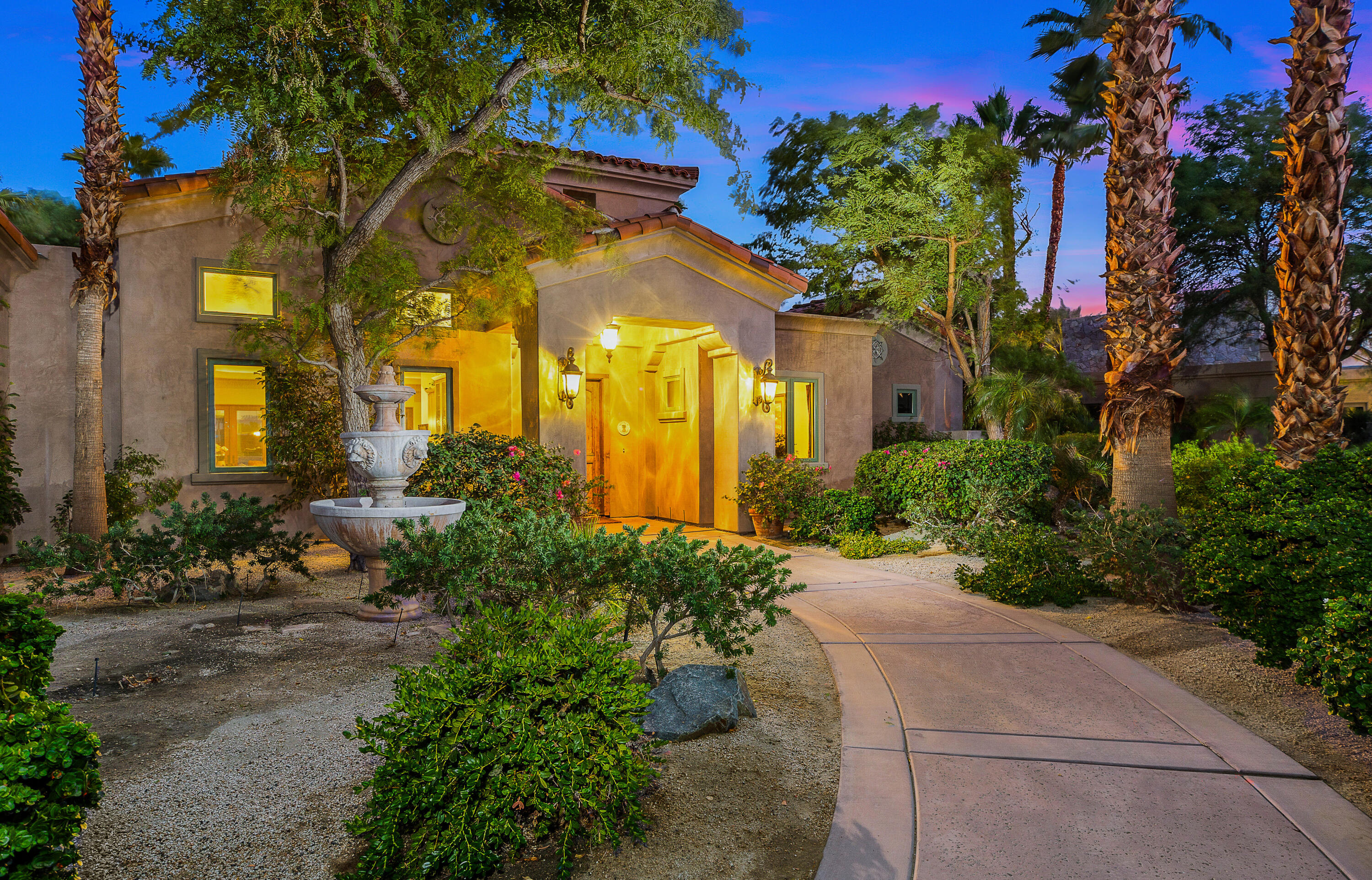 83005 North Shore Drive Indio, CA 92203 - Photo 3 of 40 a front view of a house with a yard
