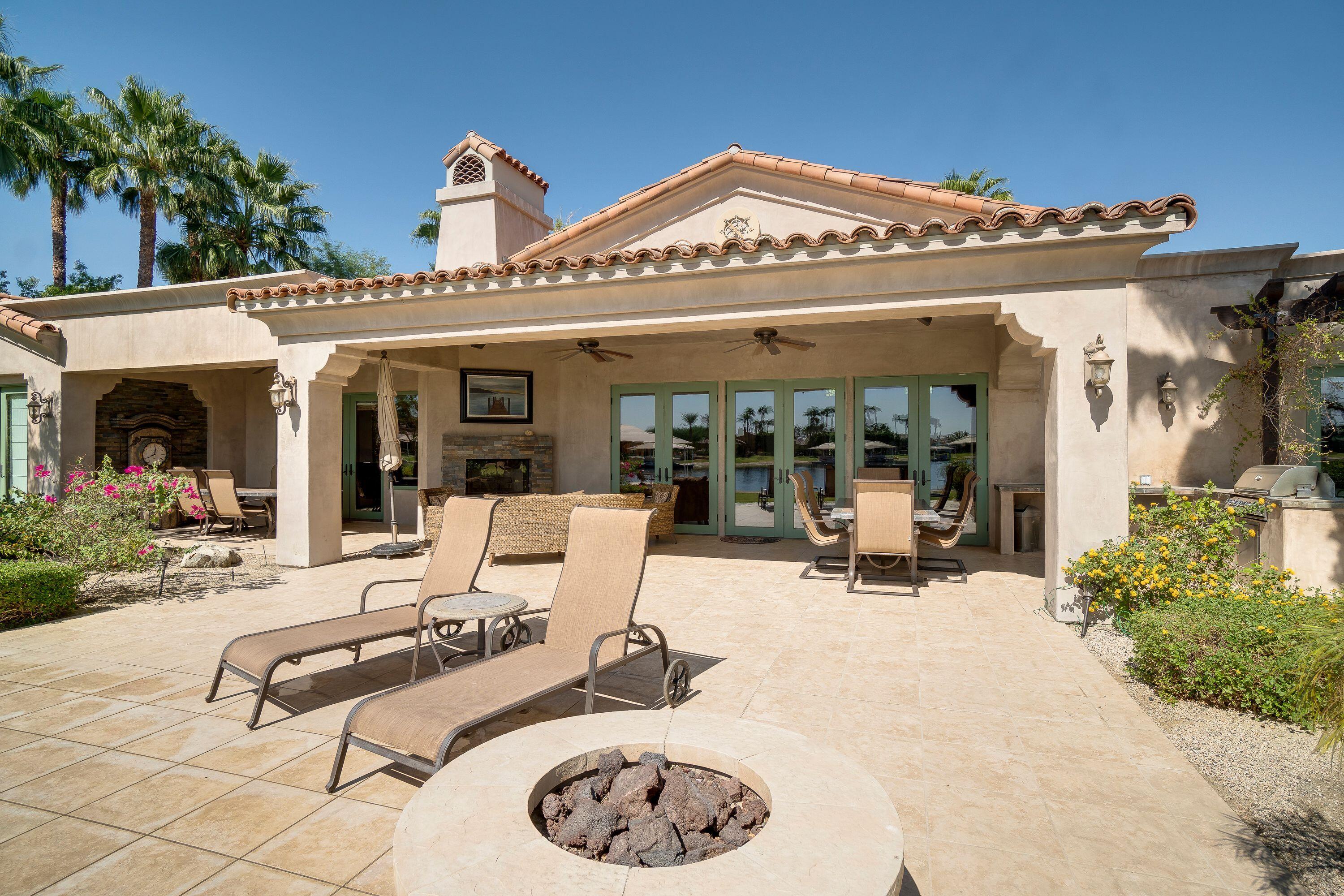 83005 North Shore Drive Indio, CA 92203 - Photo 9 of 40 a view of a dinning tables and chairs in patio