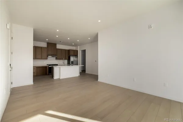 a view of a kitchen with a sink
