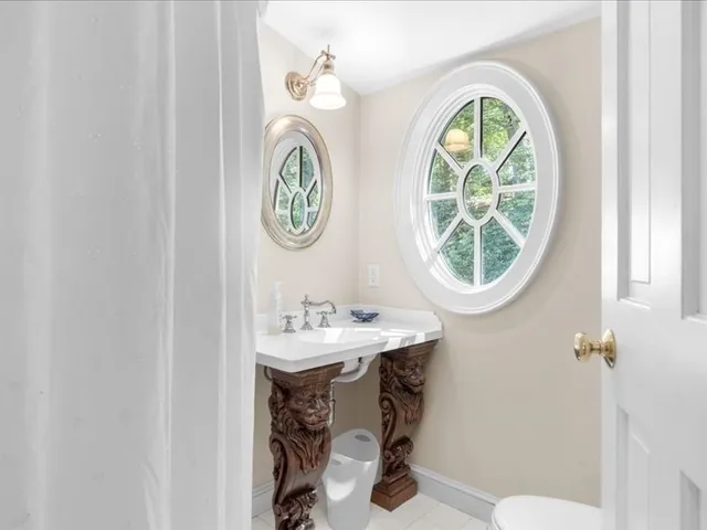 a bathroom with a toilet and a sink