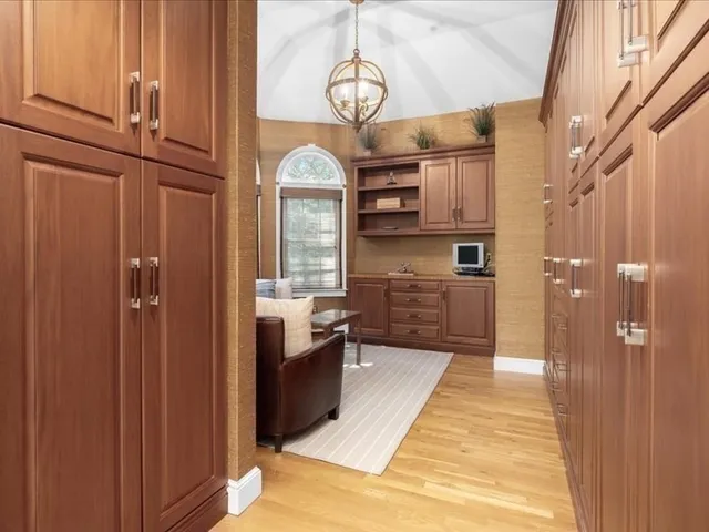a view of living room with granite countertop furniture and fireplace
