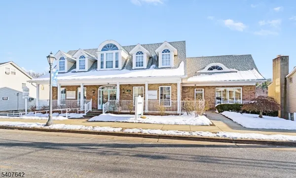 a view of a building with a patio