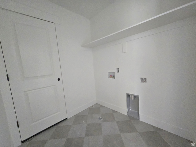 1651 West Ross Road Syracuse, UT 84075 - Photo 11 of 15 Laundry area with dark flooring and hookup for a washing machine