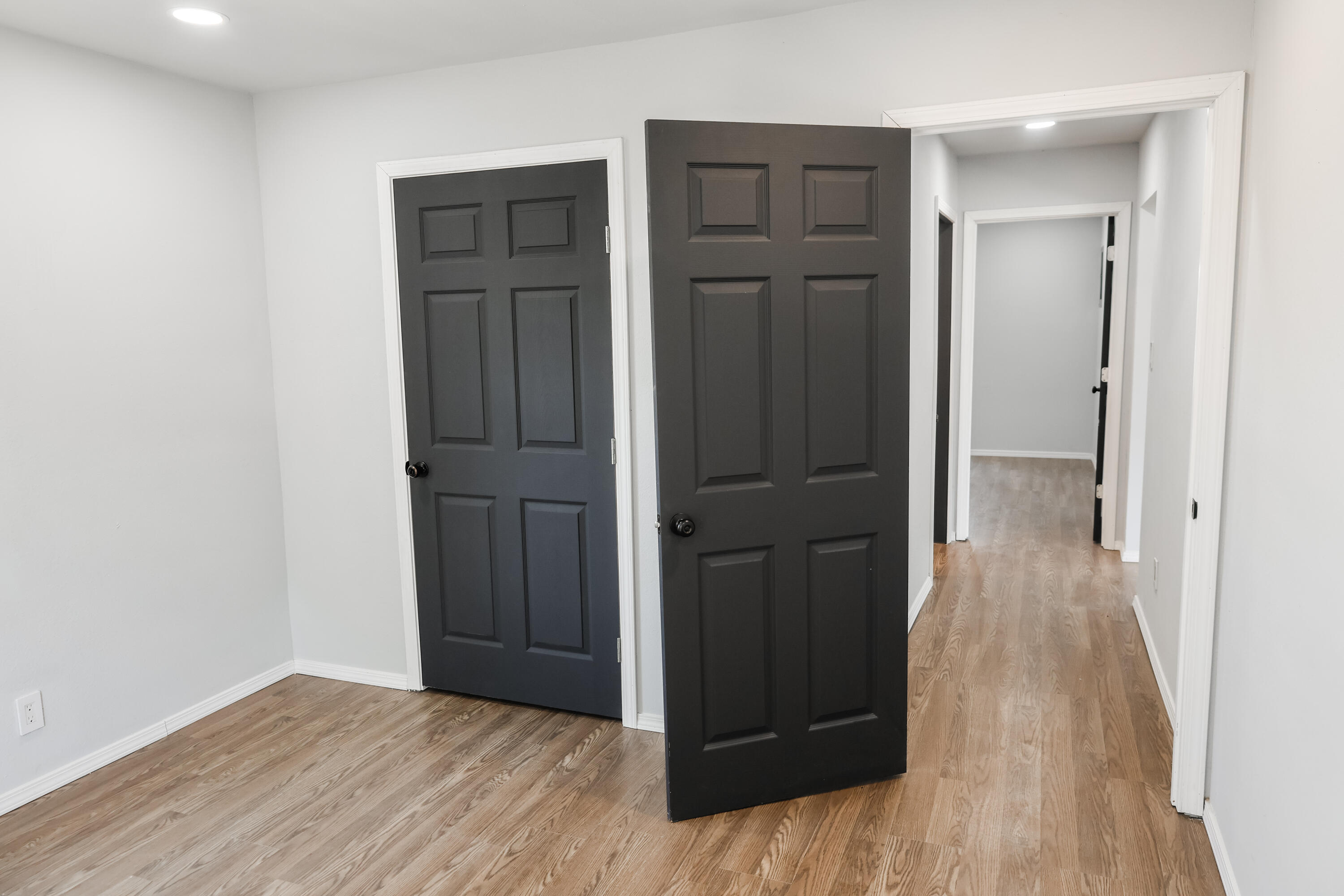 112 Southwest 8th Plainview, TX 79072 - Photo 12 of 24 a view of hallway with wooden floor