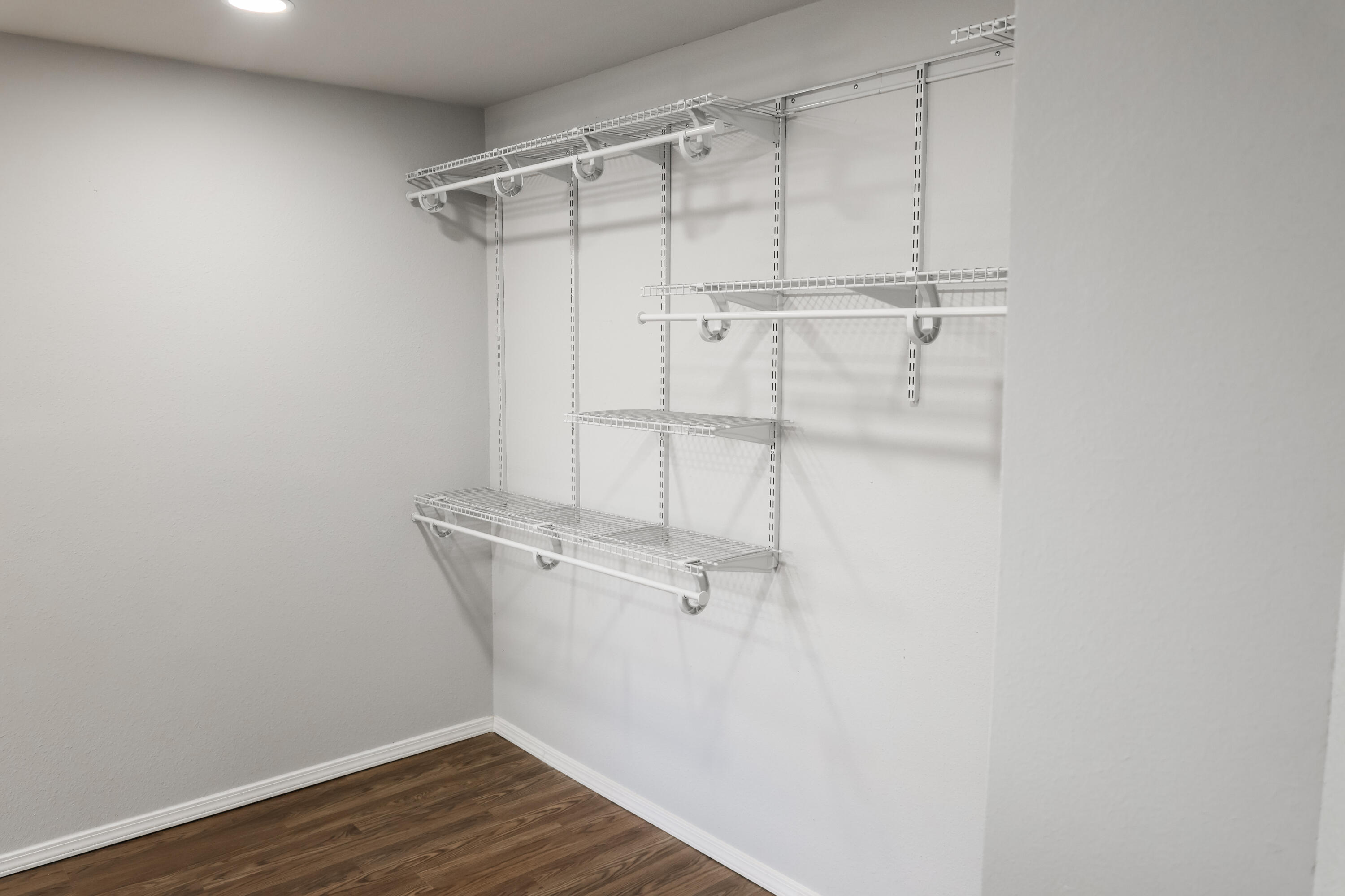 112 Southwest 8th Plainview, TX 79072 - Photo 19 of 24 a view of a room with racks on the wall