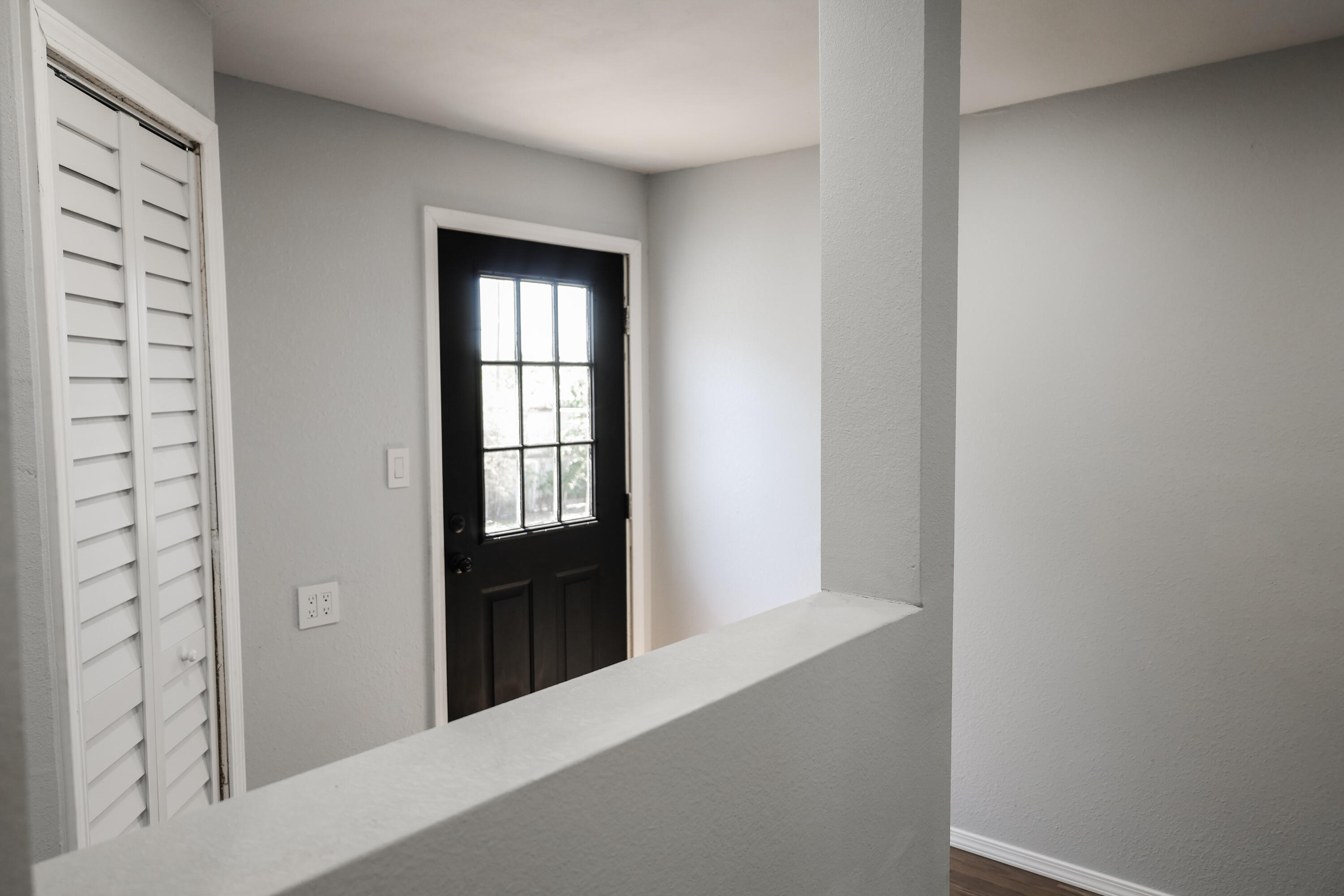112 Southwest 8th Plainview, TX 79072 - Photo 20 of 24 a view of an empty room with windows