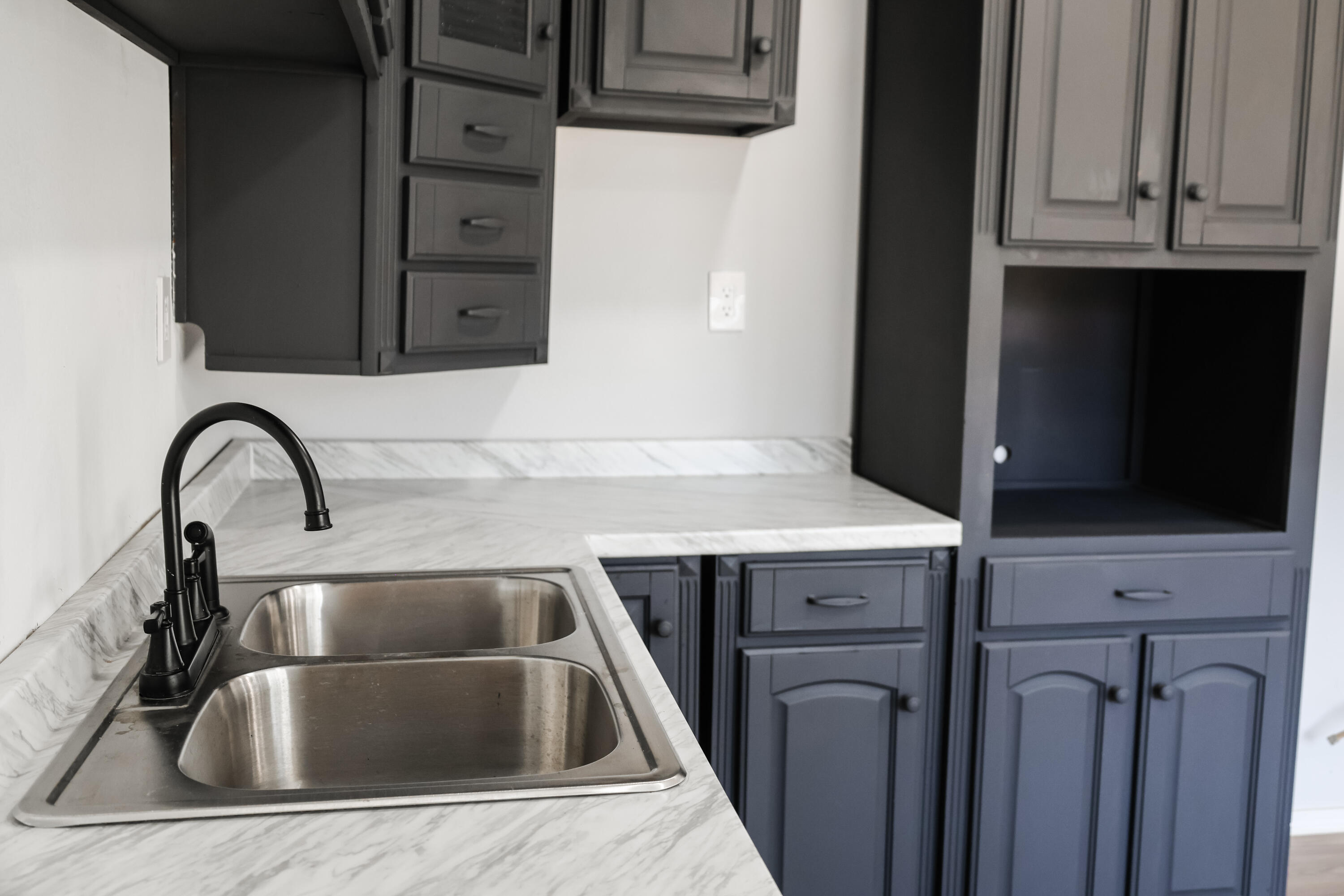 112 Southwest 8th Plainview, TX 79072 - Photo 9 of 24 a close view of sink and tap