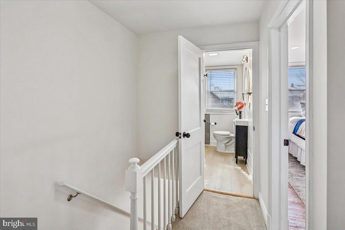 1616 Hardwick Road Towson, MD 21286 - Photo 12 of 36 a view of a hallway with closet and a white door