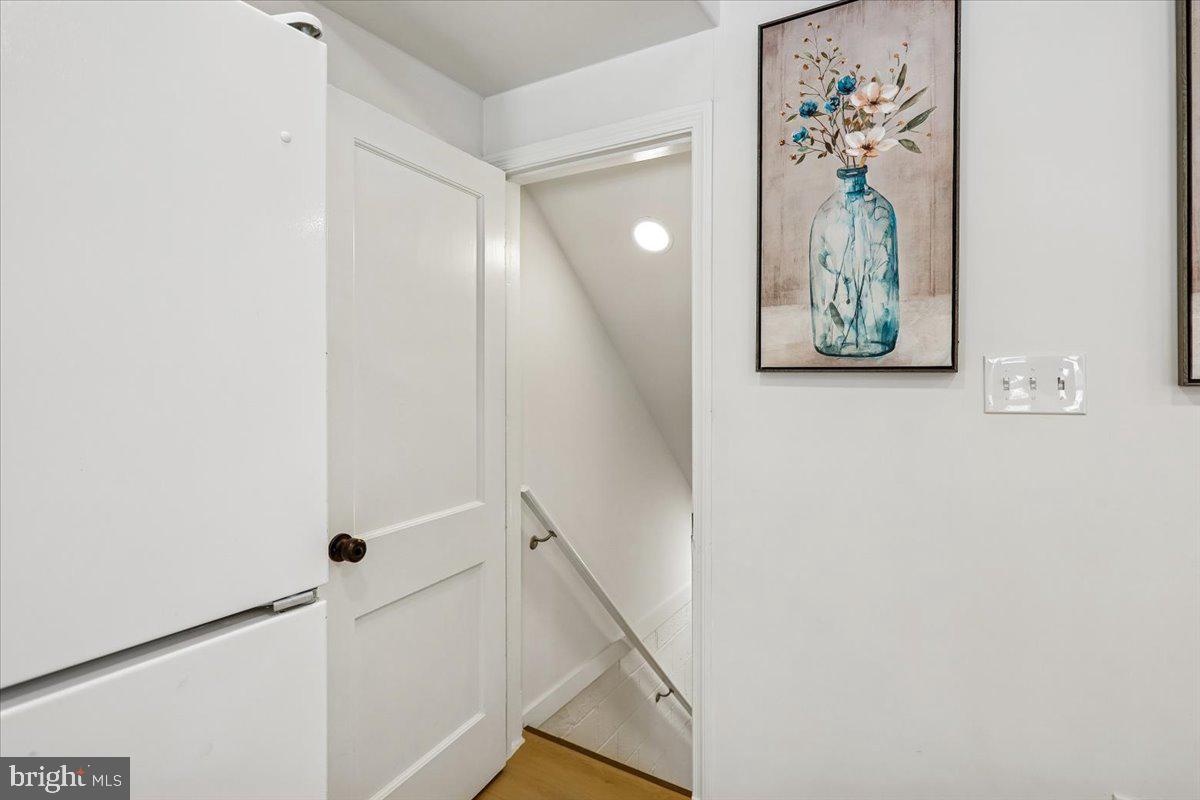1616 Hardwick Road Towson, MD 21286 - Photo 25 of 36 a view of a hallway with paintings on the wall