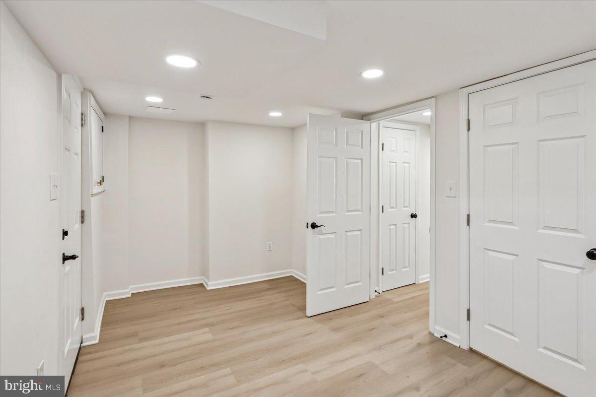 1616 Hardwick Road Towson, MD 21286 - Photo 33 of 36 a view of a hallway with wooden floor