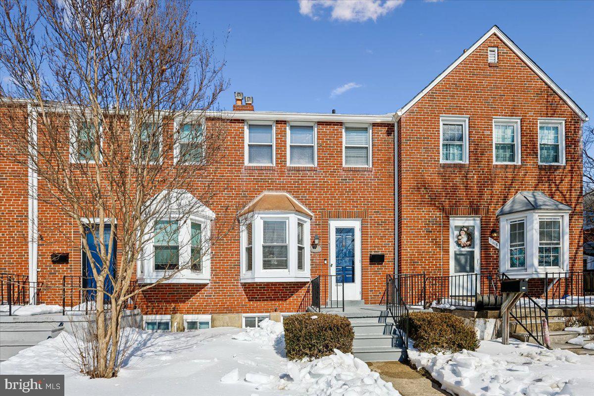 1616 Hardwick Road Towson, MD 21286 - Photo 4 of 36 a front view of a house with a yard