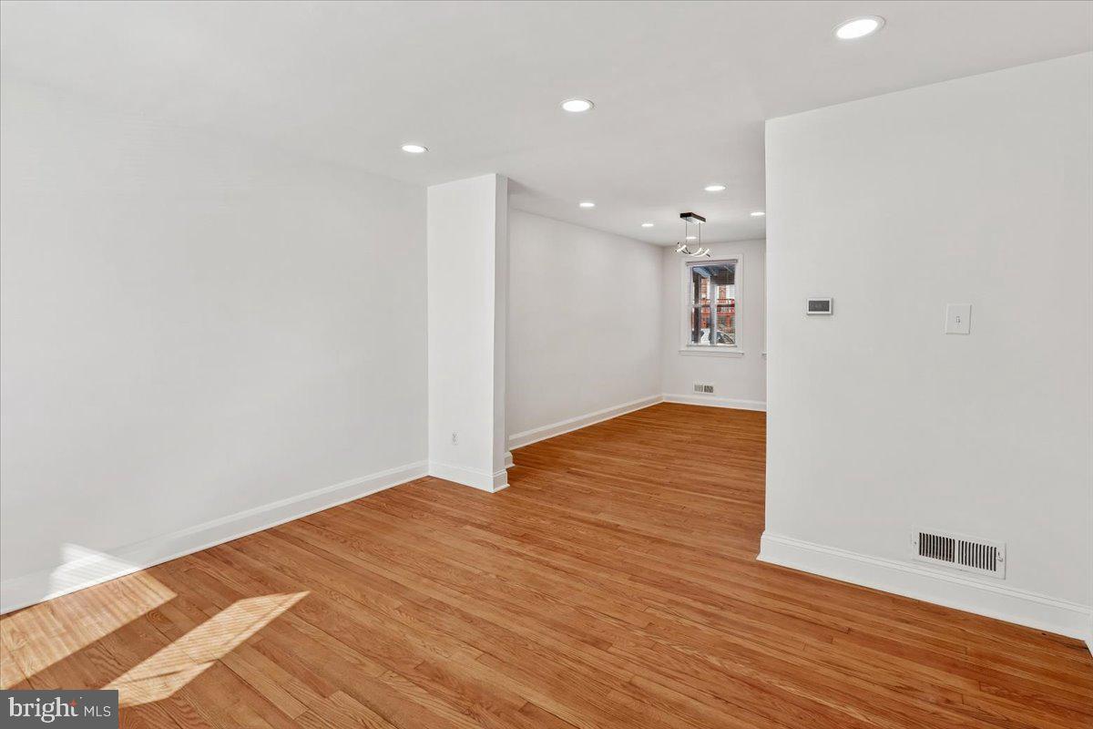 1616 Hardwick Road Towson, MD 21286 - Photo 5 of 36 a view of empty room with wooden floor