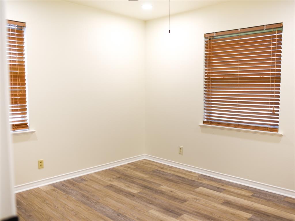 2325 North Ricketts Street Sherman, TX 75092 - Photo 20 of 28 a view of a room that has a window in it