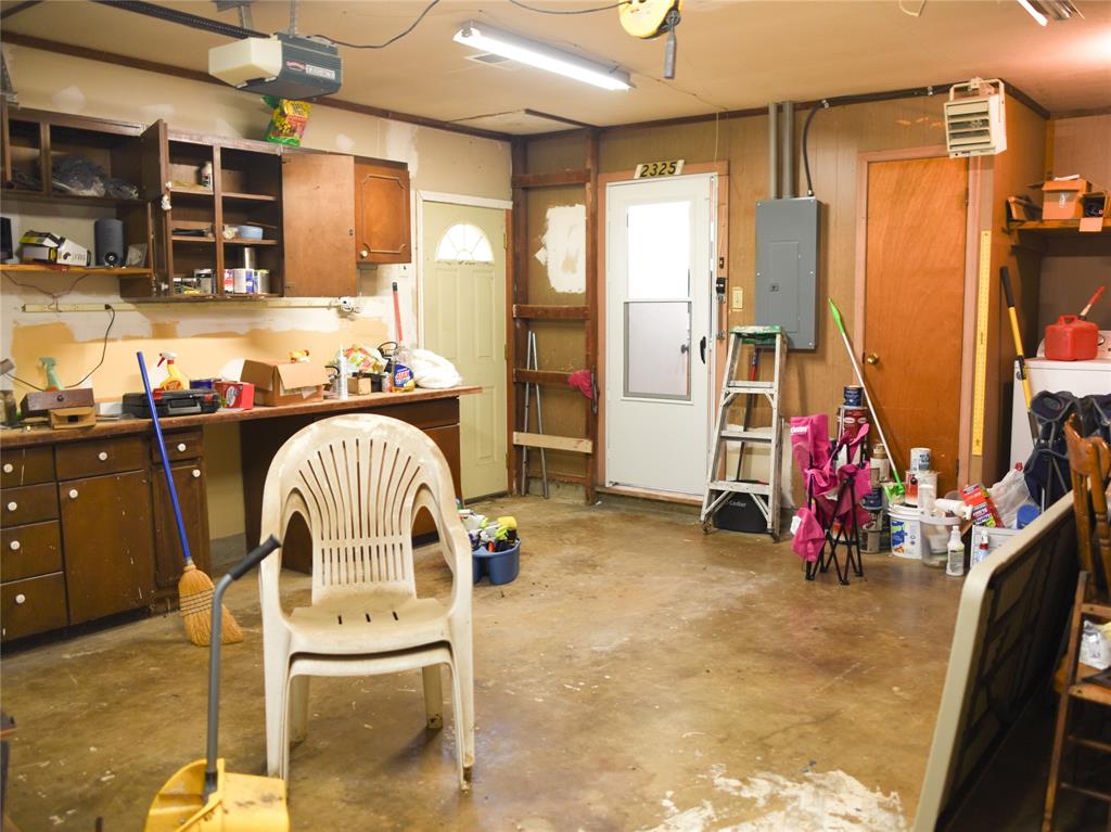 2325 North Ricketts Street Sherman, TX 75092 - Photo 24 of 28 a view of a kitchen with utility room