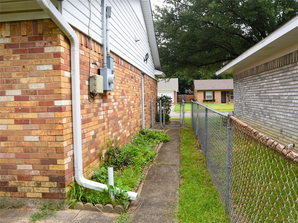 2325 North Ricketts Street Sherman, TX 75092 - Photo 27 of 28 a view of a pathway with a patio