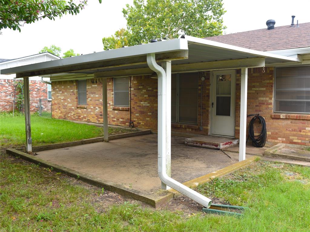 2325 North Ricketts Street Sherman, TX 75092 - Photo 28 of 28 an outdoor view of house with backyard