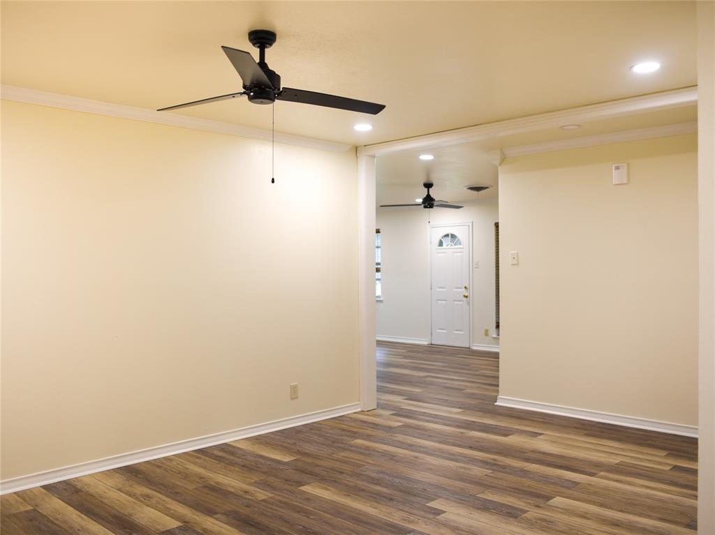 2325 North Ricketts Street Sherman, TX 75092 - Photo 3 of 28 a view of a hallway with wooden floor