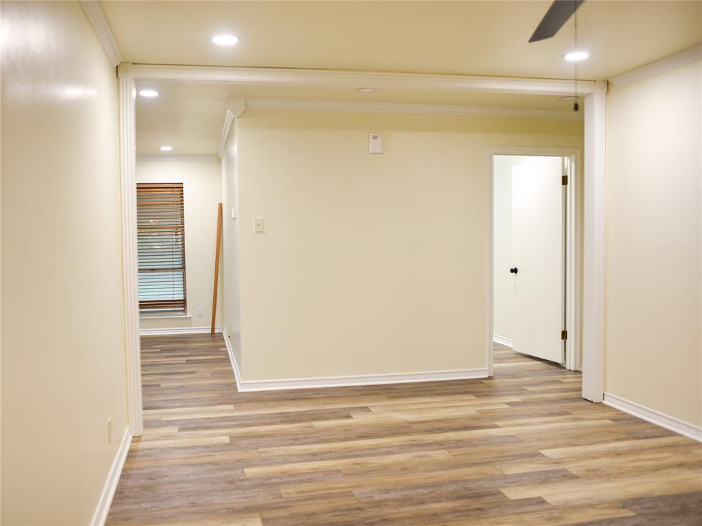 2325 North Ricketts Street Sherman, TX 75092 - Photo 6 of 28 a view of a room with wooden floor