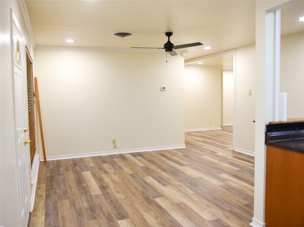 2325 North Ricketts Street Sherman, TX 75092 - Photo 10 of 28 a view of room with wooden floor