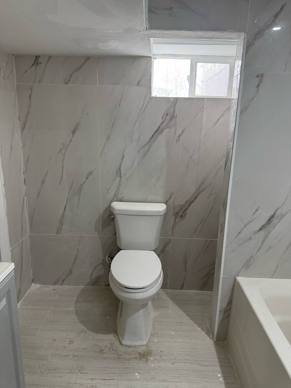 244 Wilbur Street, Unit 3 Fall River, MA 02724 - Photo 16 of 21 a bathroom with a toilet and a shower