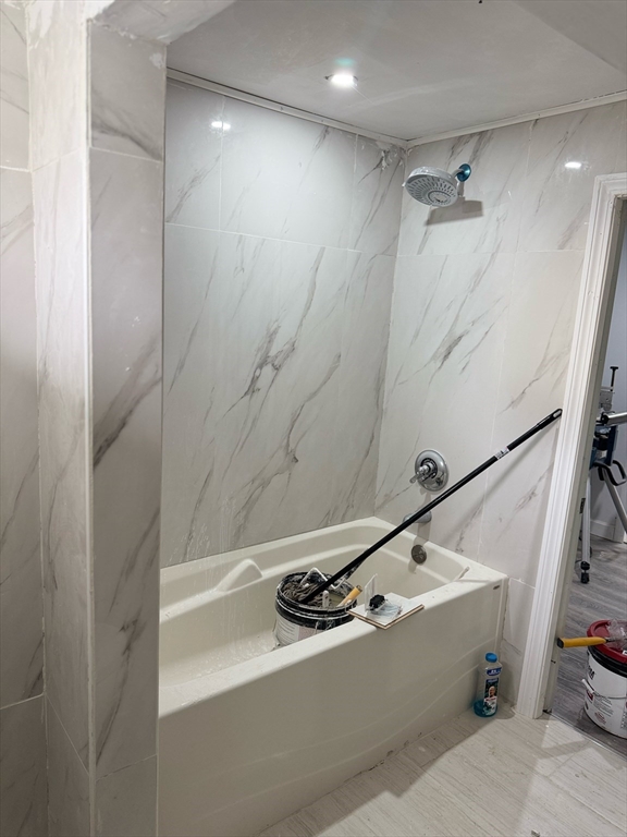 244 Wilbur Street, Unit 3 Fall River, MA 02724 - Photo 17 of 21 a bathroom with a tub and a shower