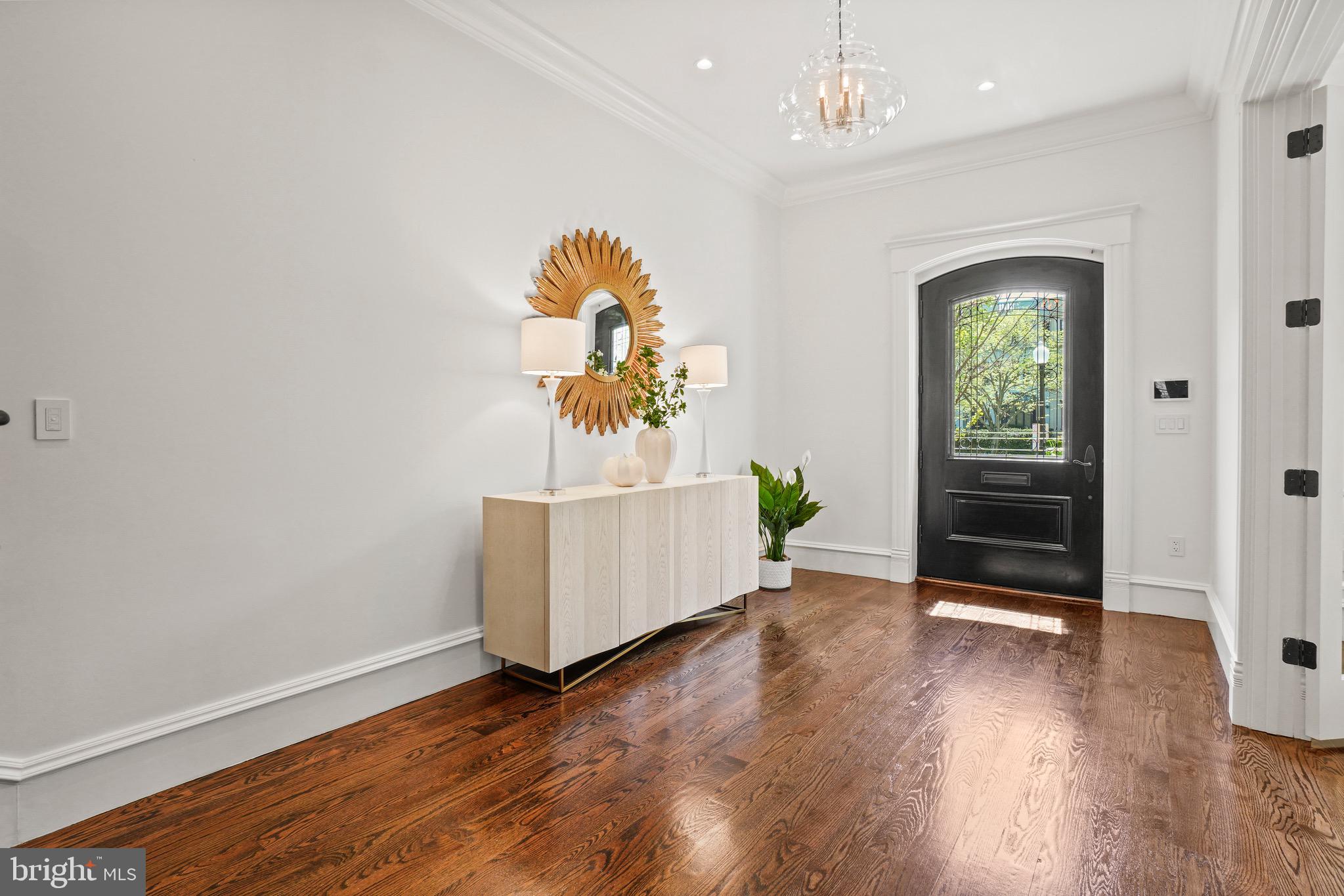 2211 Massachusetts Avenue Northwest Washington, DC 20008 - Photo 15 of 94 Graceful Entrance w/ Custom Mahogany Door