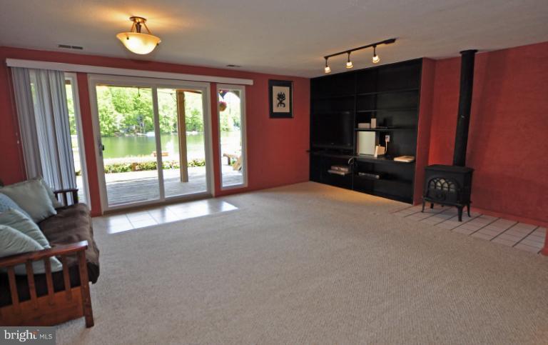 2013 Chadds Ford Drive Reston, VA 20191 - Photo 11 of 24 The lower level rec room has a wood-burning stove.