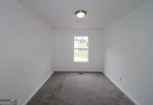 an empty room with a window