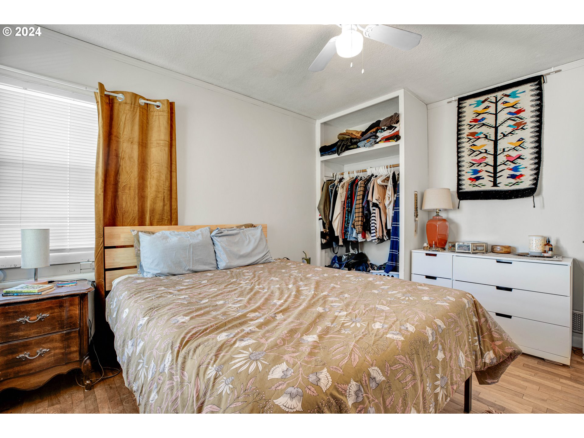 1315 North Russet Street Portland, OR 97217 - Photo 11 of 21 a bedroom with a bed and a large mirror