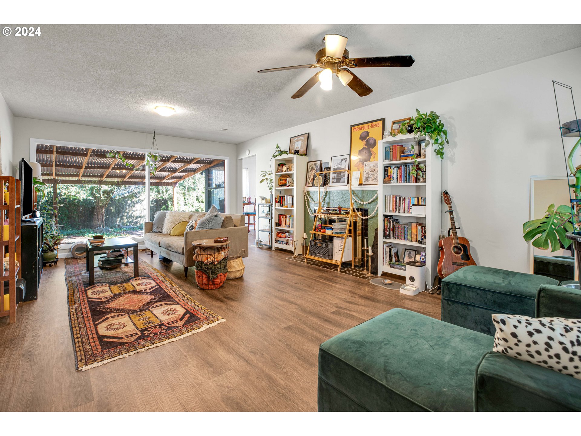 1315 North Russet Street Portland, OR 97217 - Photo 2 of 21 a living room with furniture and a large window