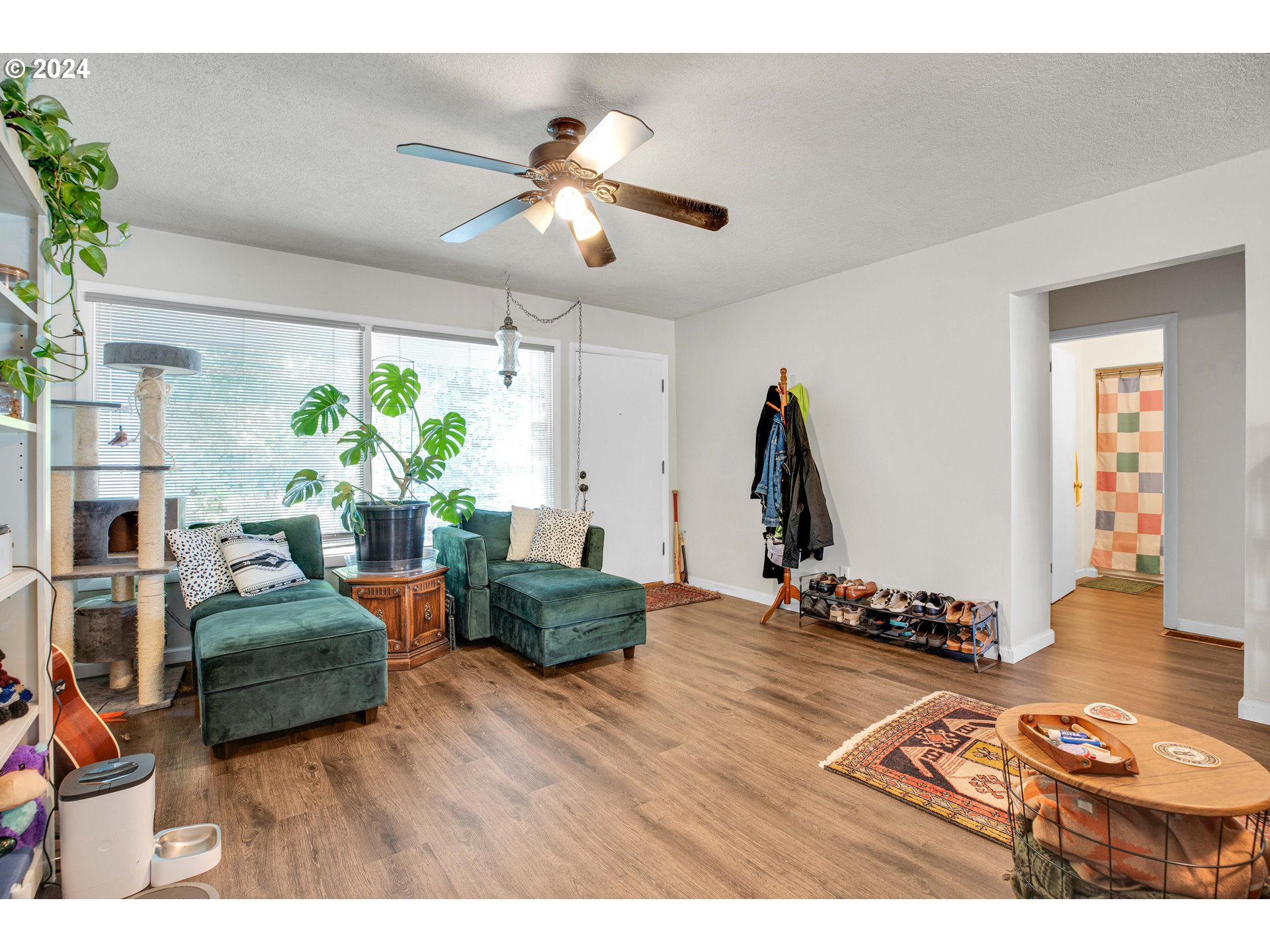 1315 North Russet Street Portland, OR 97217 - Photo 3 of 21 a living room with furniture and a chandelier