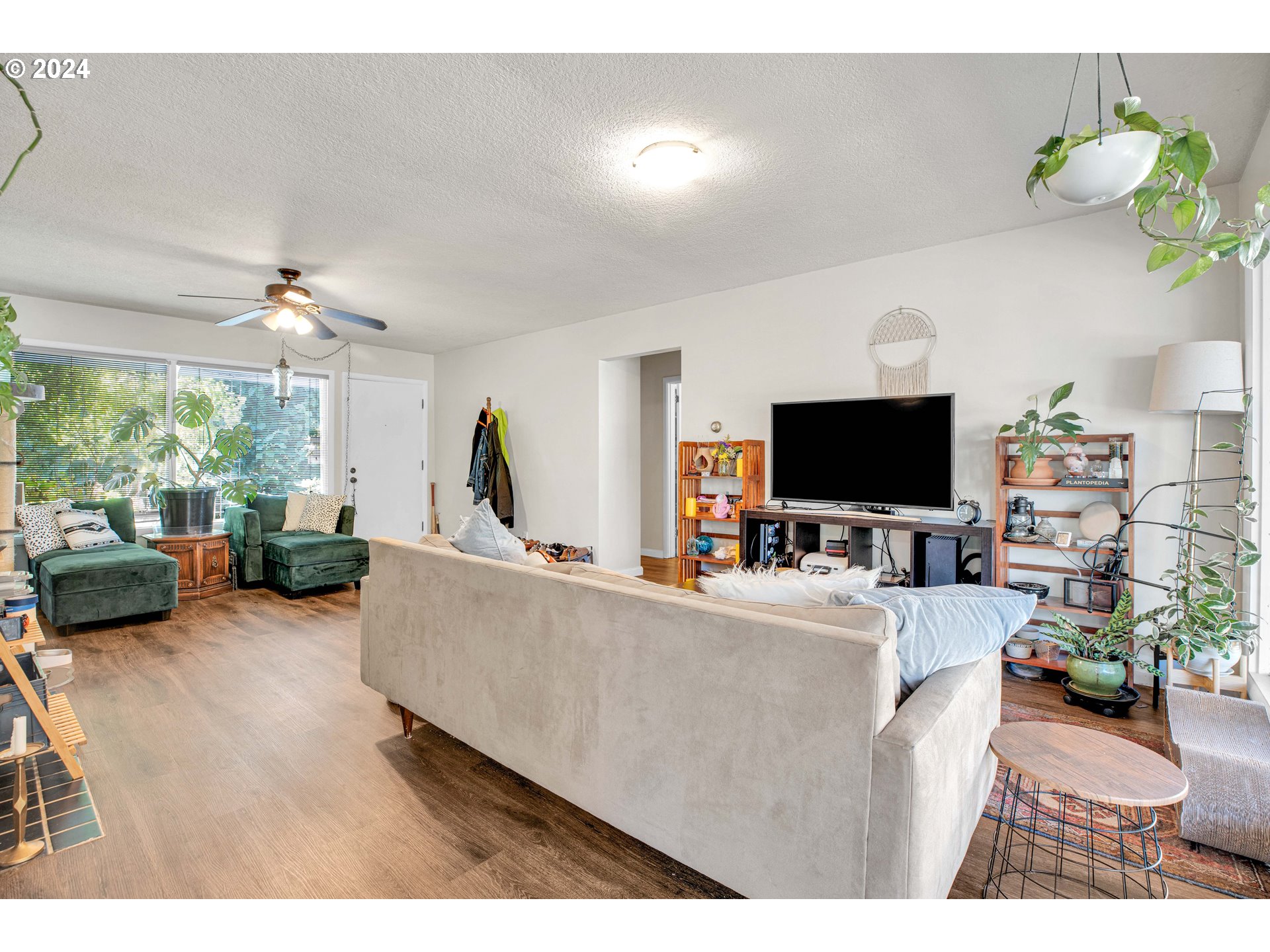 1315 North Russet Street Portland, OR 97217 - Photo 5 of 21 a living room with furniture and a flat screen tv