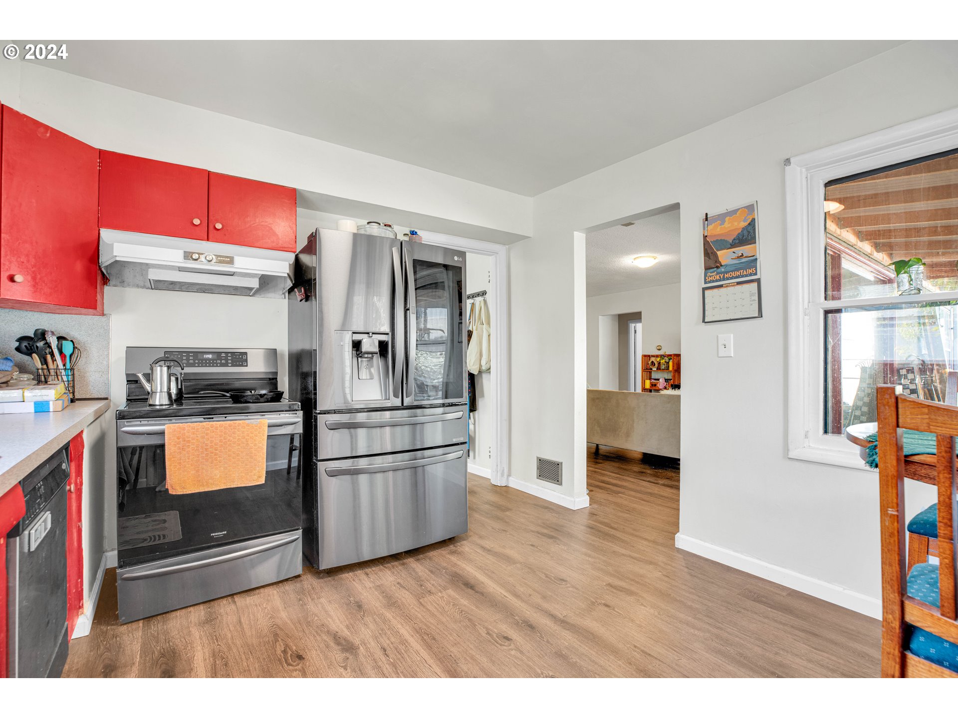 1315 North Russet Street Portland, OR 97217 - Photo 7 of 21 a kitchen with stainless steel appliances granite countertop a refrigerator and a stove