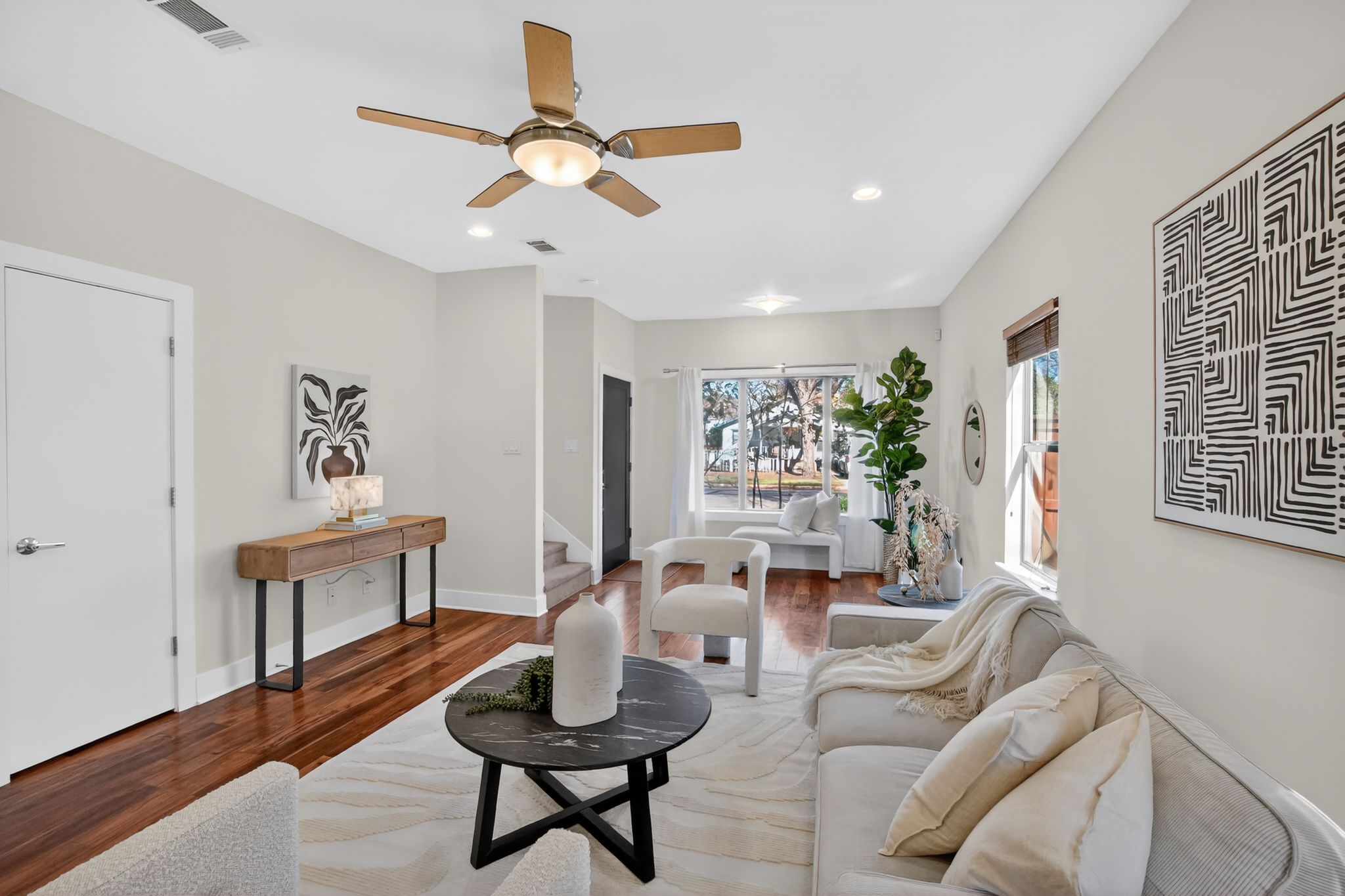 1203 East 2nd Street, Unit A Austin, TX 78702 - Photo 10 of 39 a living room with furniture