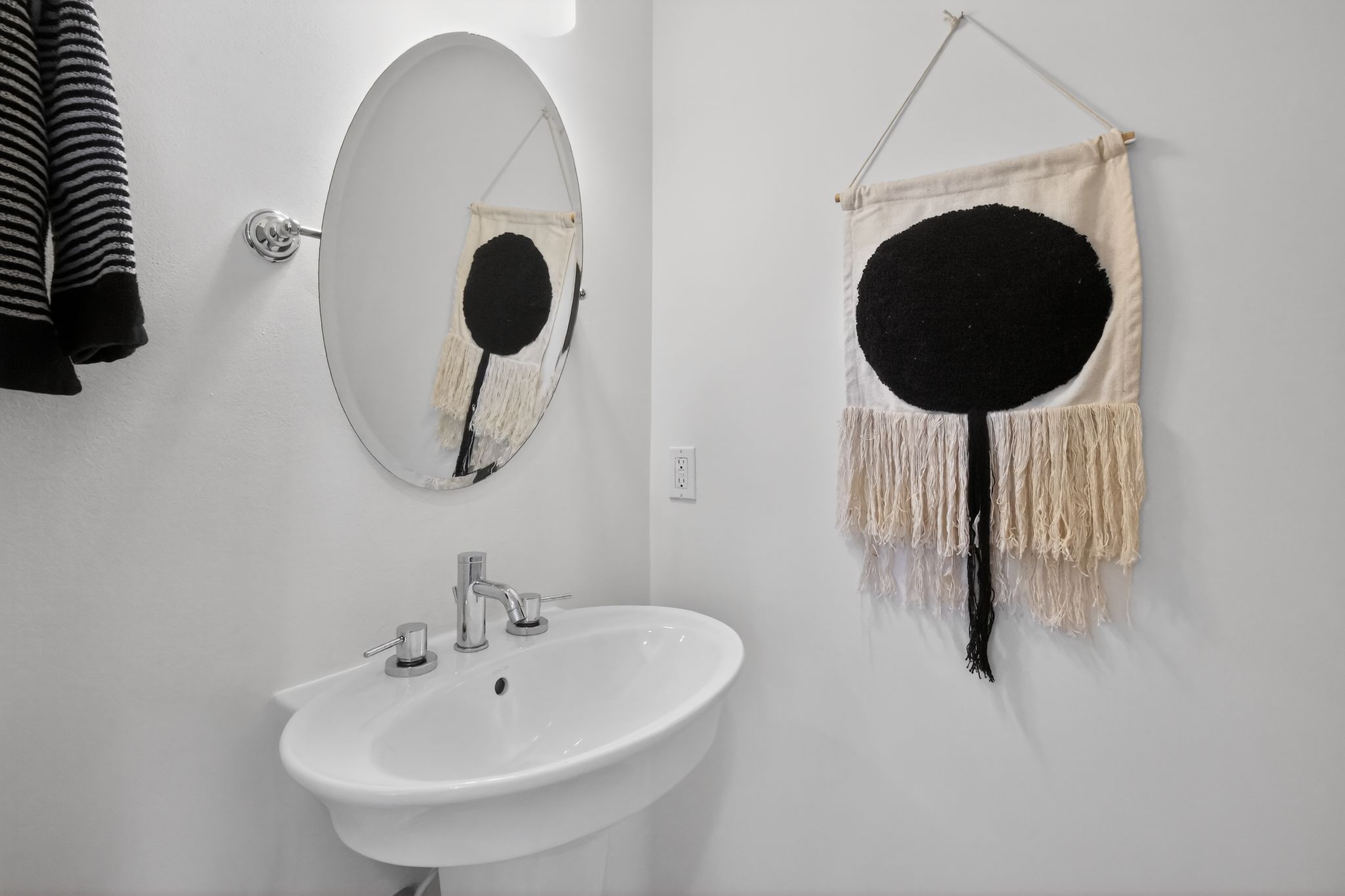 1203 East 2nd Street, Unit A Austin, TX 78702 - Photo 11 of 39 a bathroom with a sink and a mirror