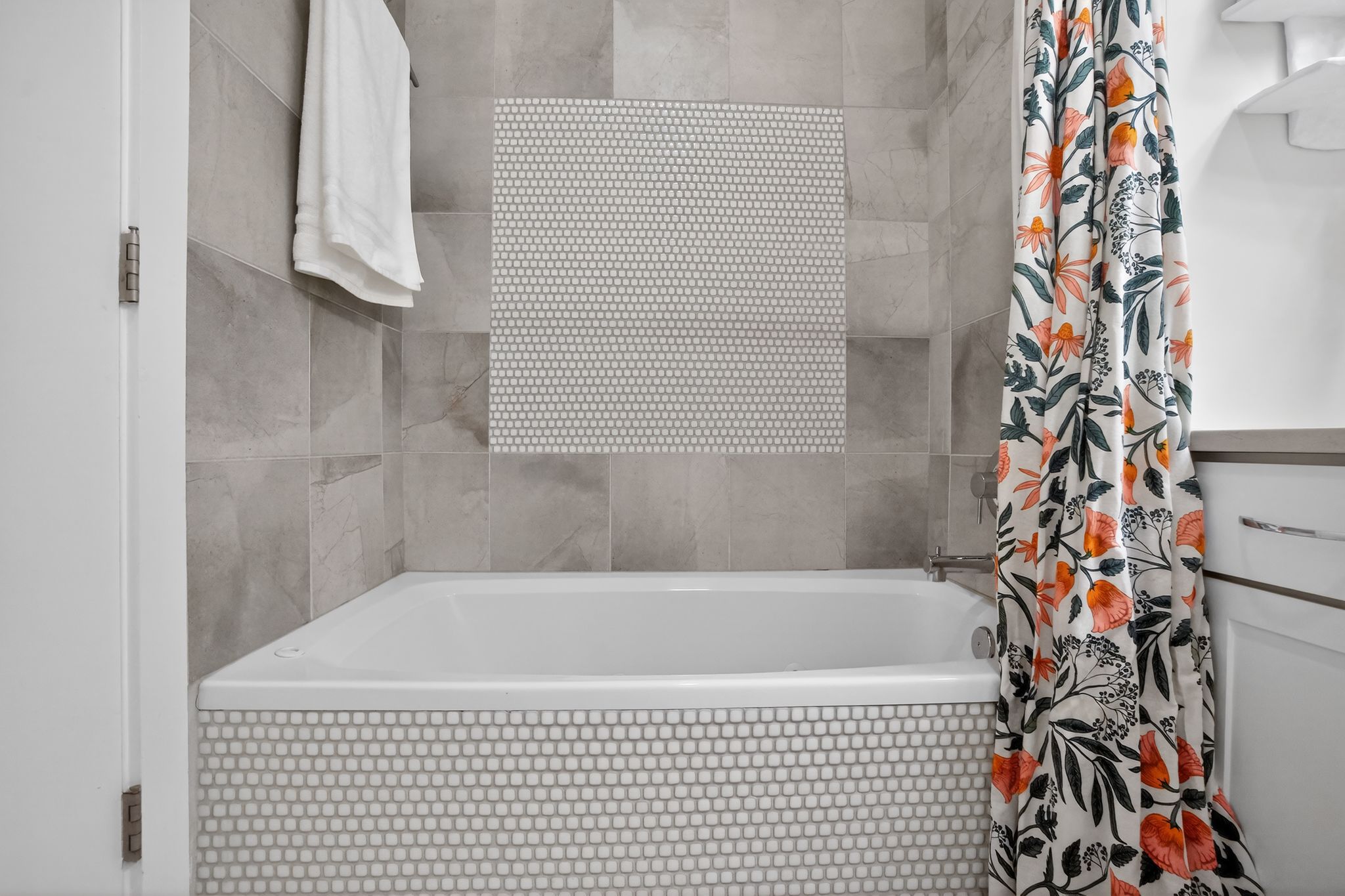 1203 East 2nd Street, Unit A Austin, TX 78702 - Photo 30 of 39 a bathroom with a bathtub and shower