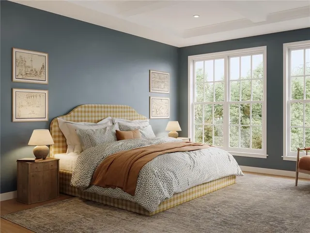 a bedroom with a bed and window