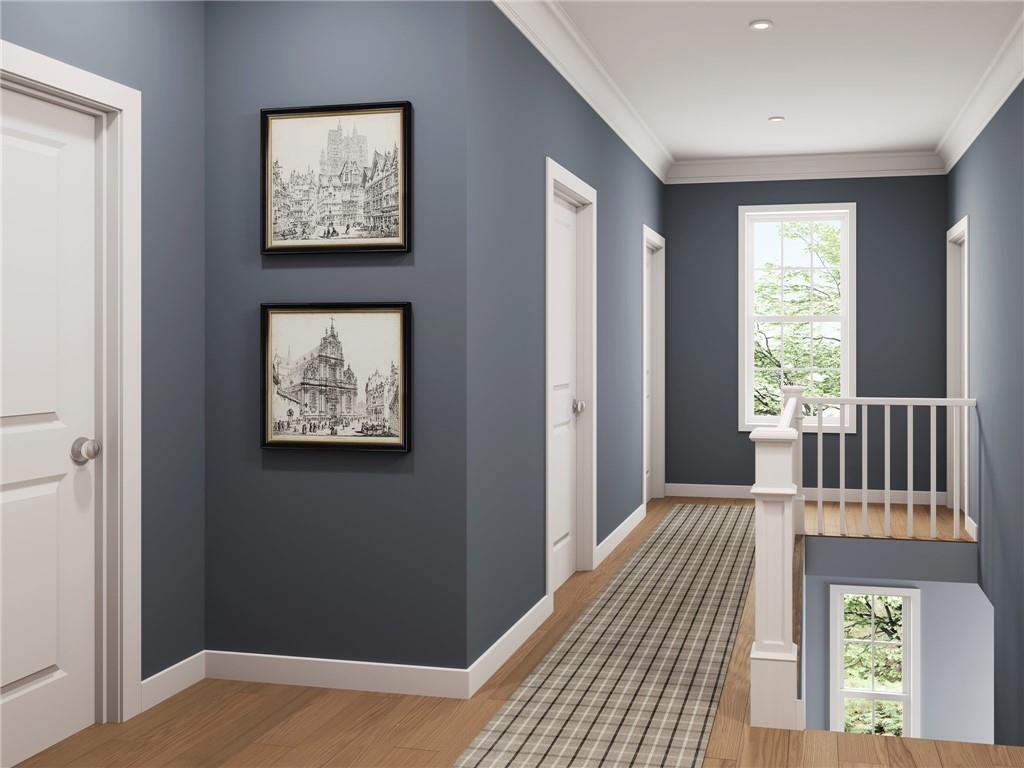 102 Ramsgate Road, Unit DUNDEE Cranberry Township, PA 16066 - Photo 10 of 34 a view of a hallway with wooden floor and a window