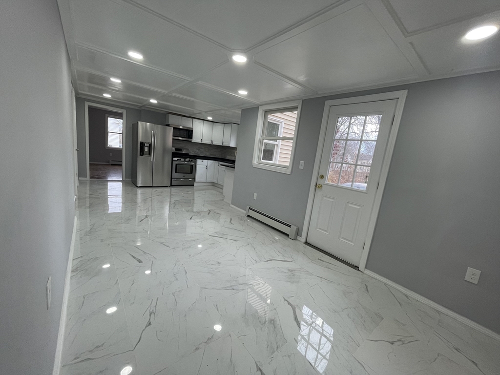 59 High Street Warren, MA 01083 - Photo 8 of 42 wooden floor in an empty room with a window