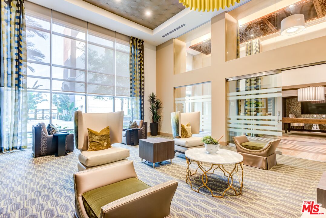 7290 Edinger Avenue, Unit 3103 Huntington Beach, CA 92647 - Photo 12 of 24 a outdoor living space with furniture