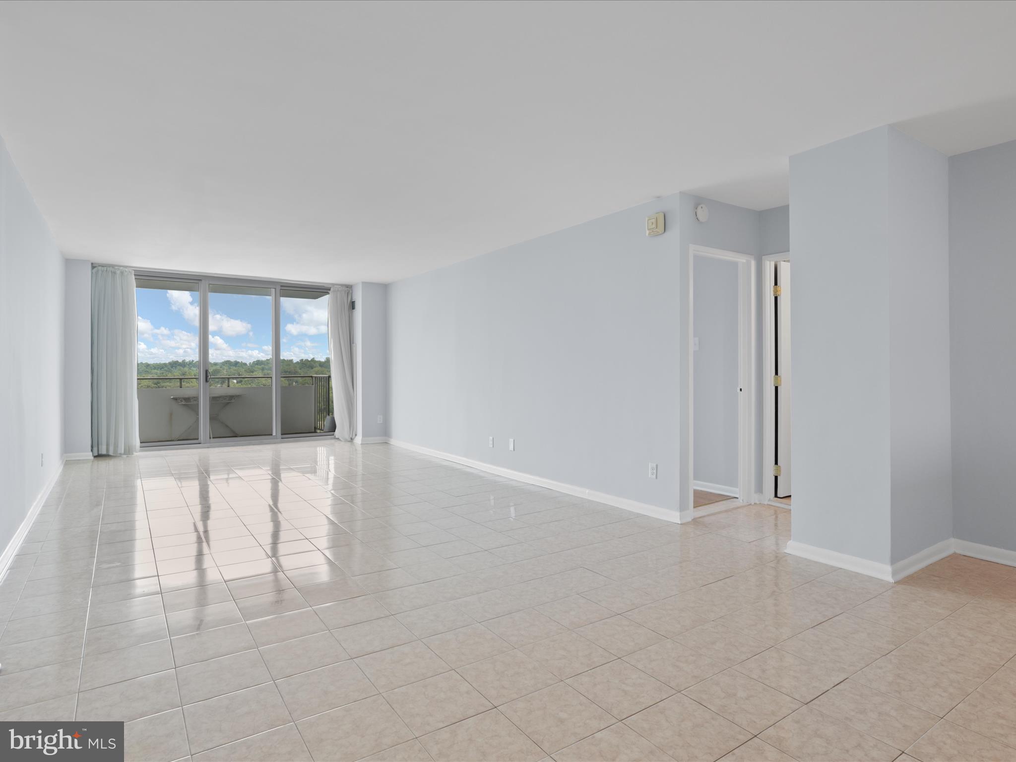 5101 River Road, Unit 1807 Bethesda, MD 20816 - Photo 11 of 32 a view of an empty room with a window