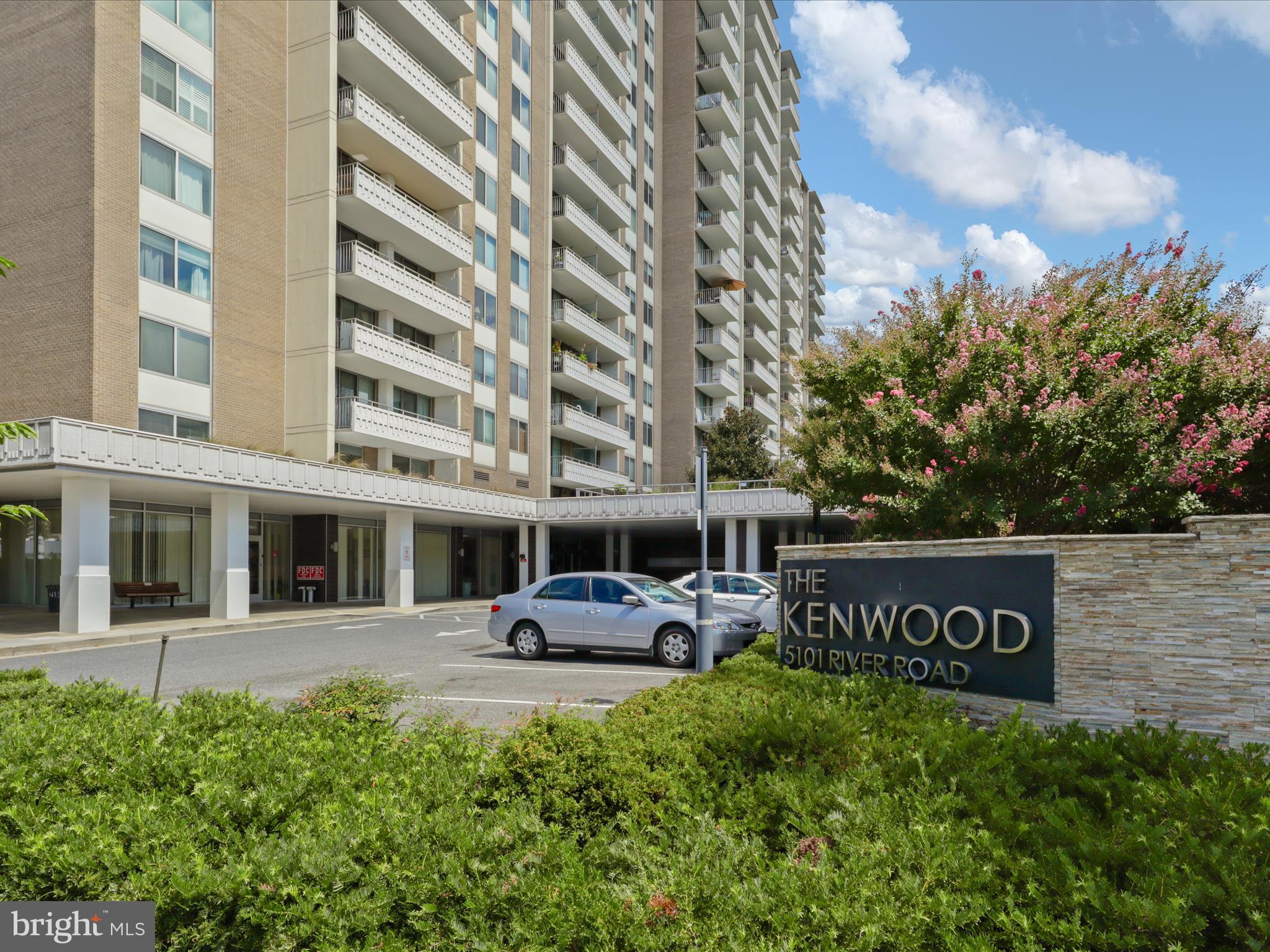 5101 River Road, Unit 1807 Bethesda, MD 20816 - Photo 31 of 32 a front view of a building with garden and trees