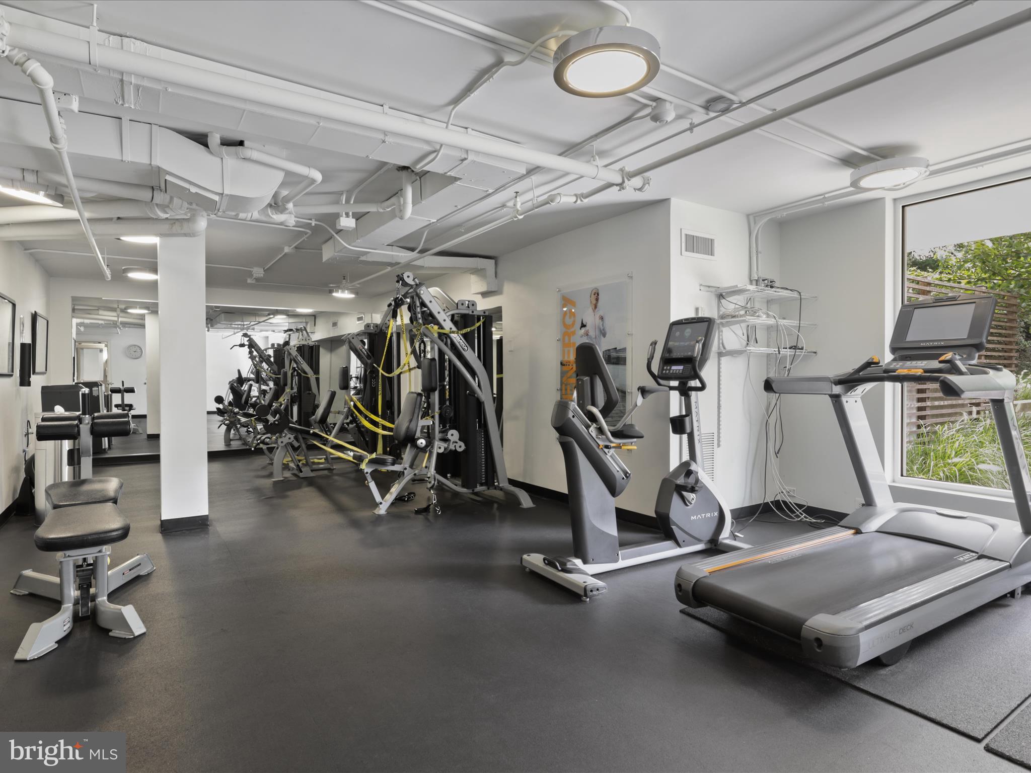 5101 River Road, Unit 1807 Bethesda, MD 20816 - Photo 9 of 32 a view of a room with gym equipment